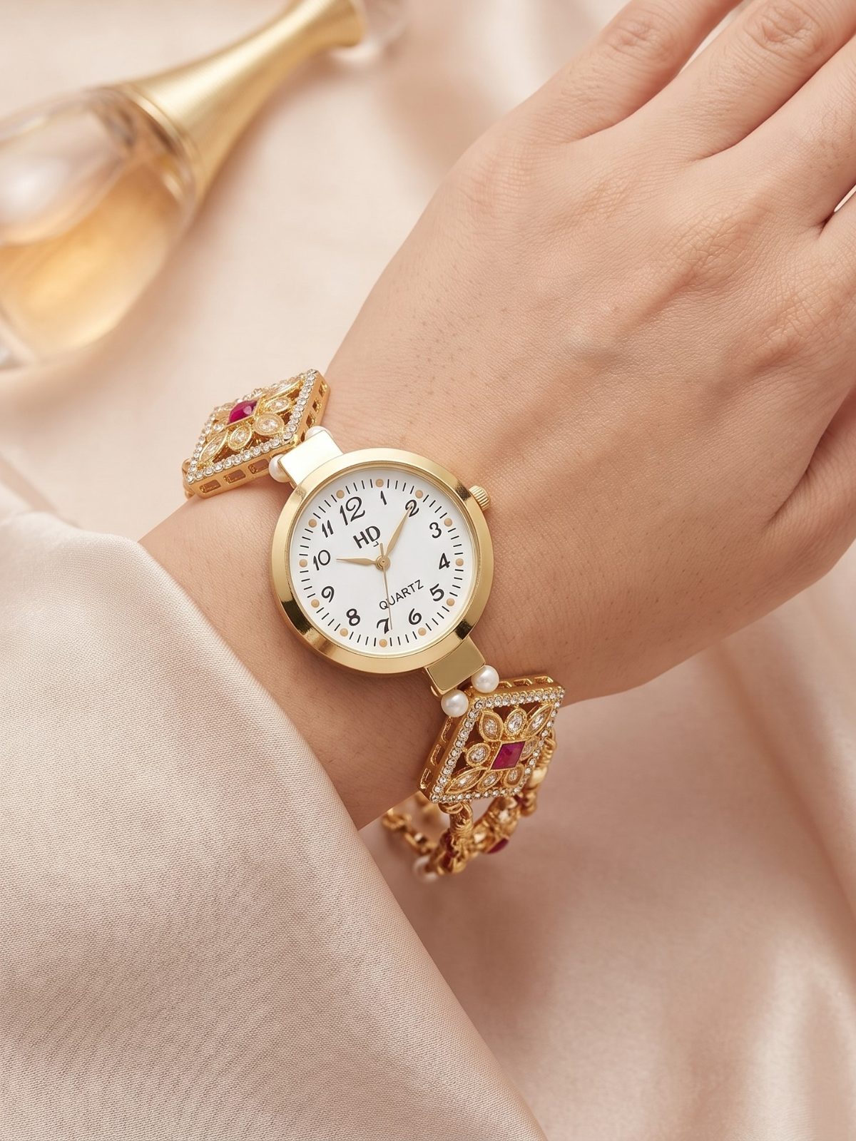 Kashvi Gold Plated Intricate Design Bracelet Watch