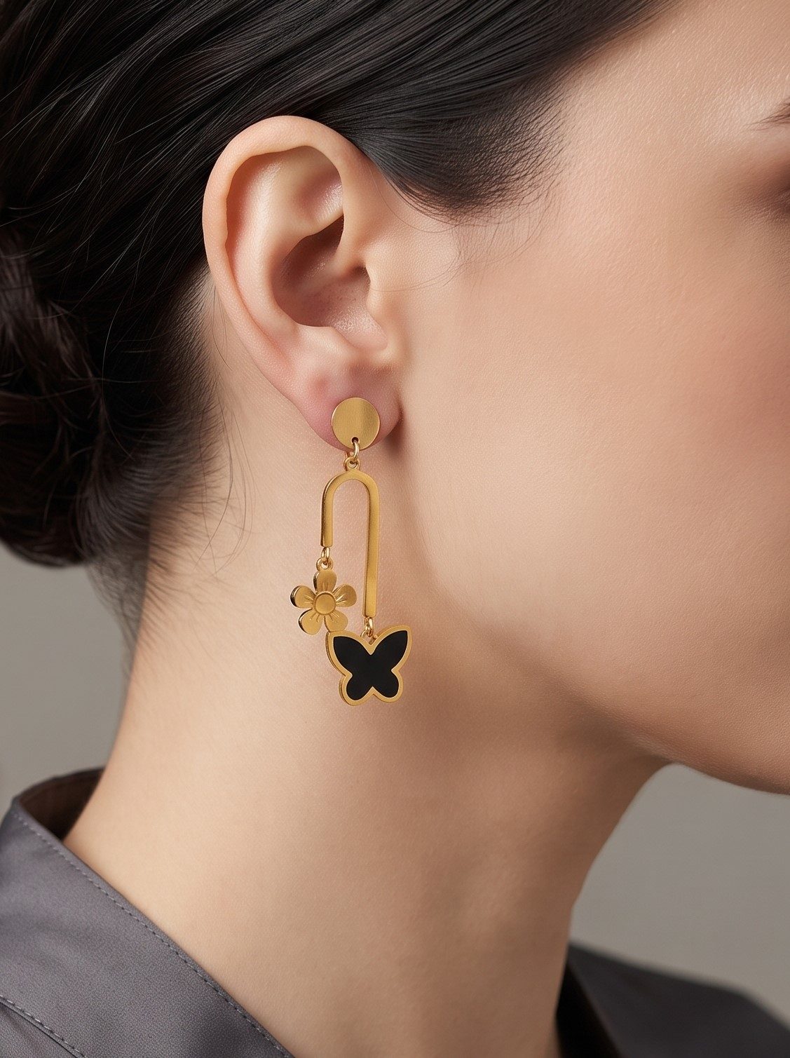 Navya Gold Plated Butterfly and Flower Charm Earrings