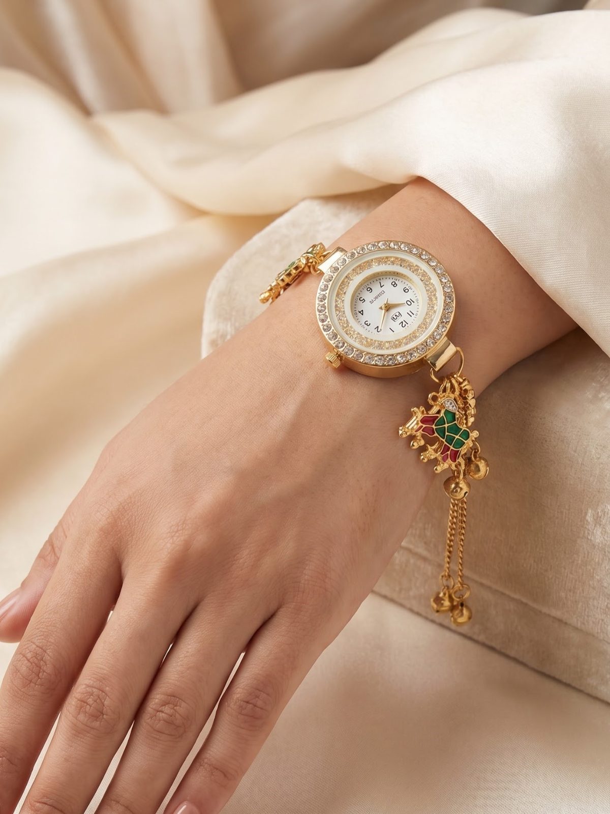 Ishika Gold Plated Charm Bracelet Watch